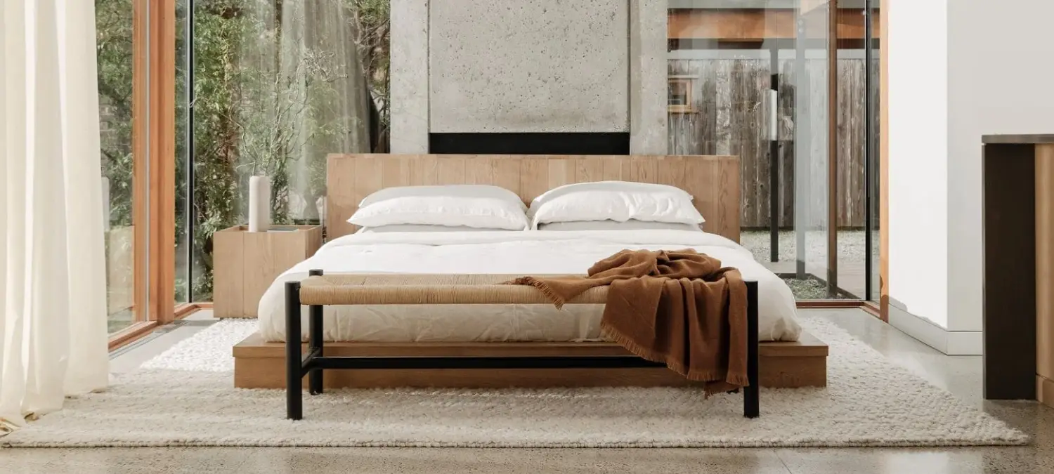 Calm minimalist bedroom with natural materials