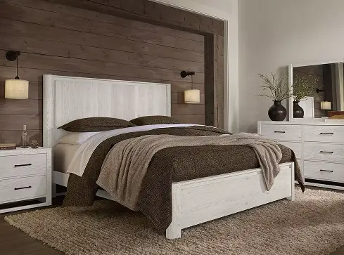 Bedroom with a coordinated bed, nightstands, and dresser