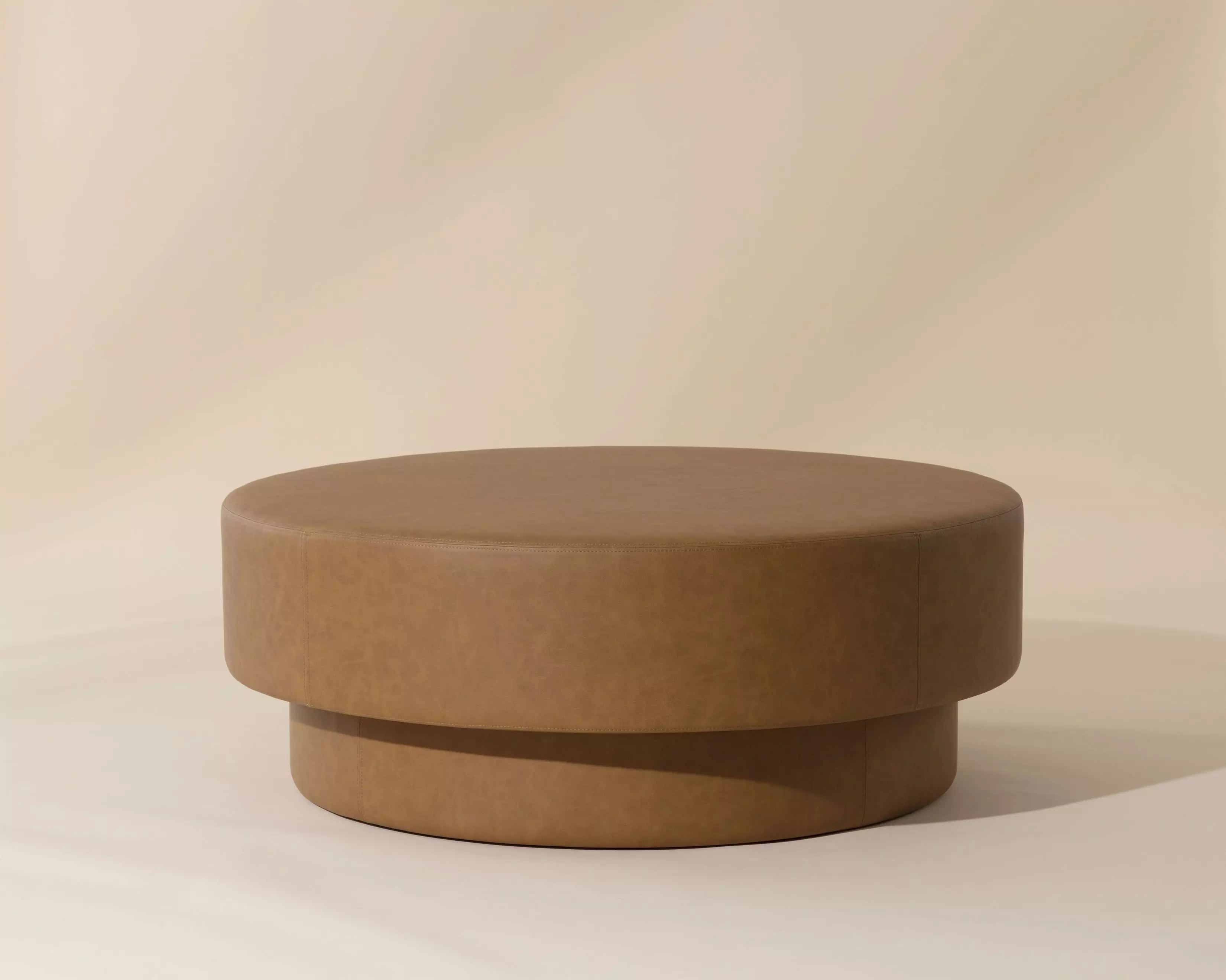 Jamie Modern Classic Brown Faux Leather Round Ottoman