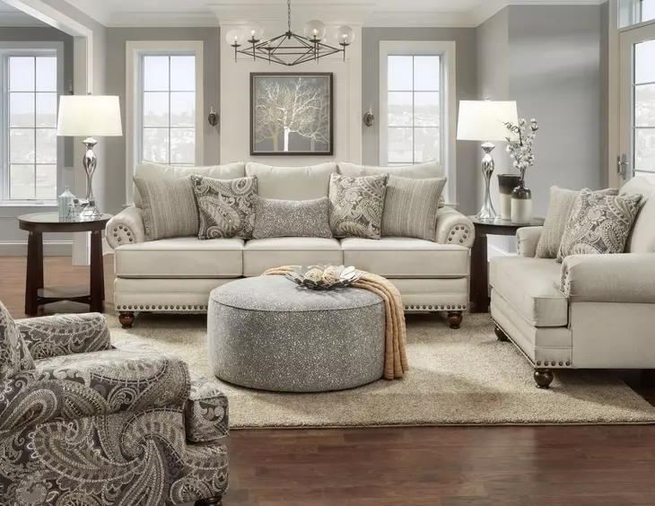 Carys Doe Beige Upholstered Rectangular Ottoman with Nailhead Trim