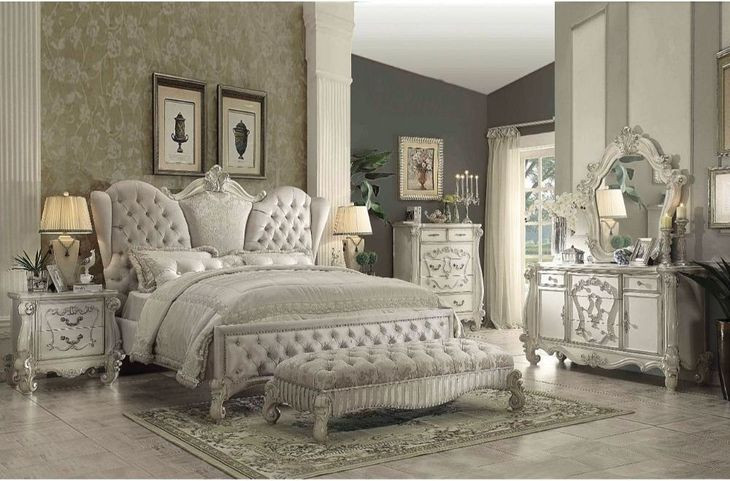 Versailles Ivory and Bone White King Upholstered Panel Bed with Nailhead Trim