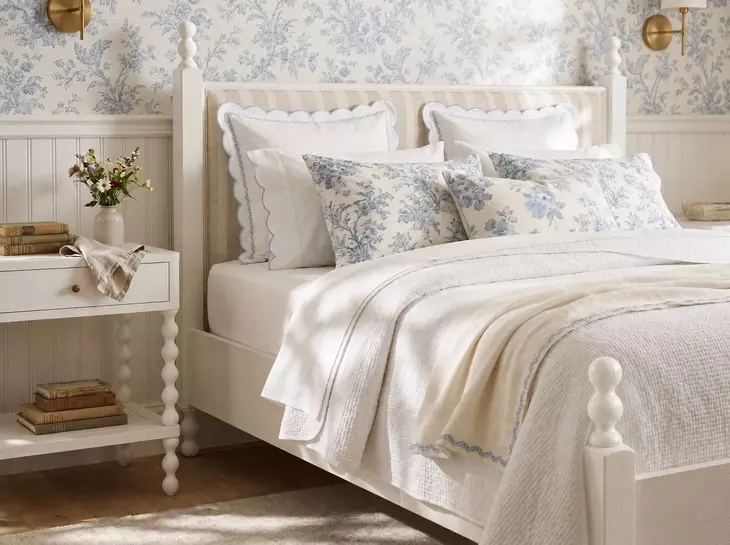 Haven Warm White King Upholstered Finial Poster Bed