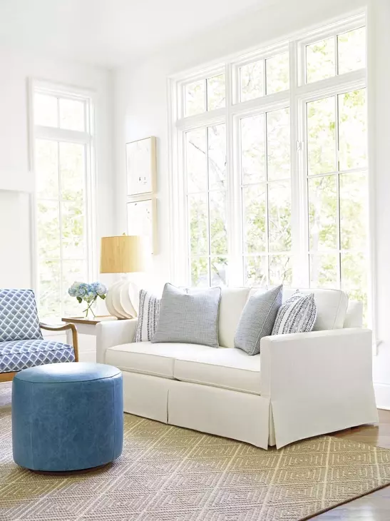 Three Arch Blue Leather Upholstered Ottoman