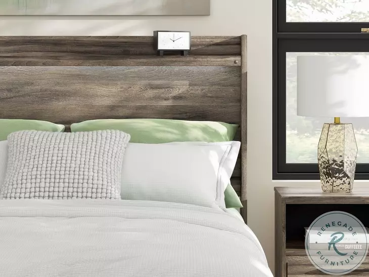 Jusika Brown Queen Panel Storage Bed