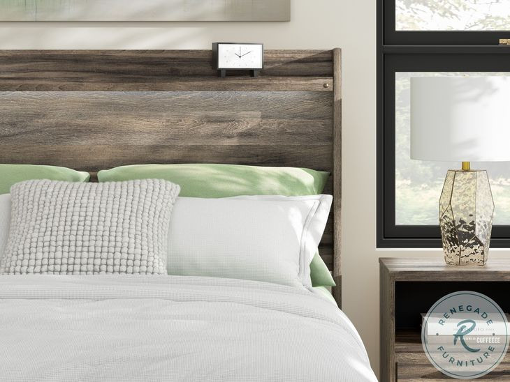 Jusika Brown King Panel Storage Bed