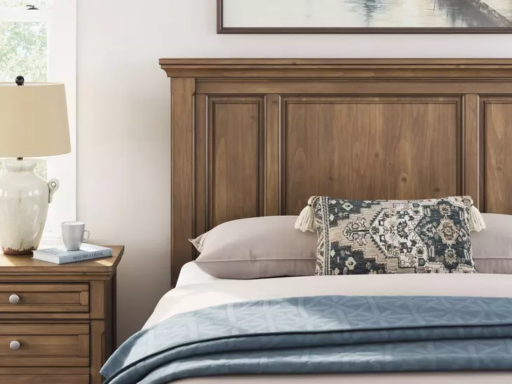 Vandenmore Medium Brown Queen Storage Panel Bed