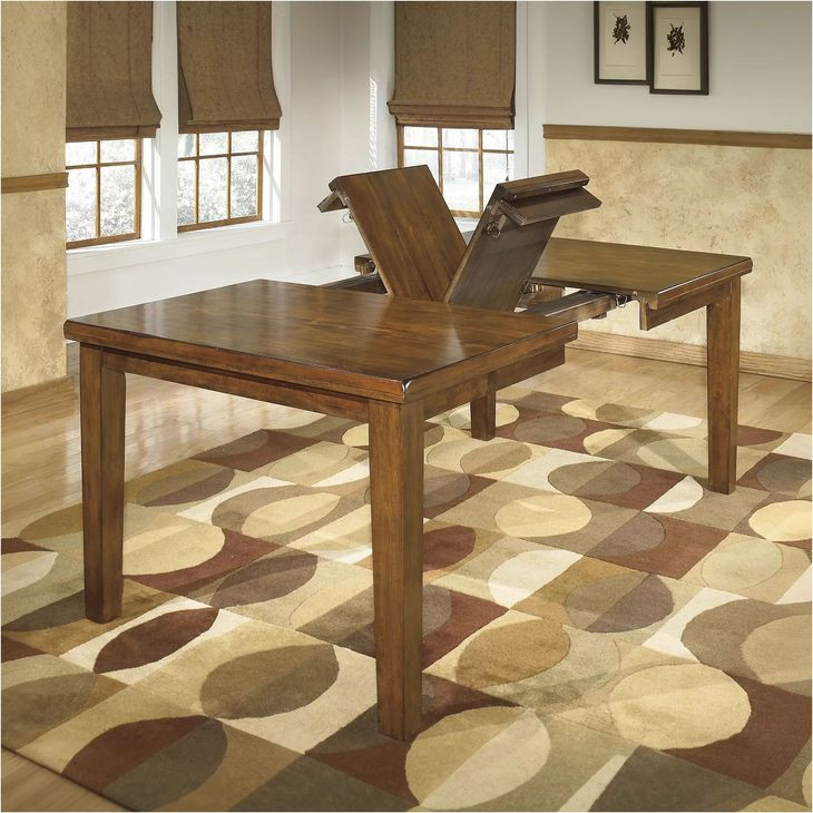 Ralene Medium Brown Rectangular Butterfly Extendable Dining Table
