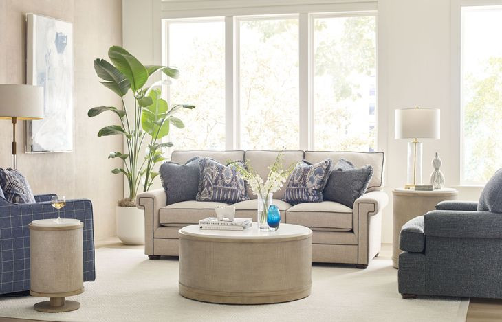 Hidden Treasures White and Brown Round Quartz Top Cocktail Table
