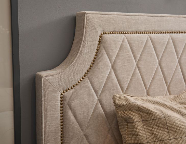 Oakridge Medley Piano Brown Upholstered Queen Panel Bed with Nailhead Trim