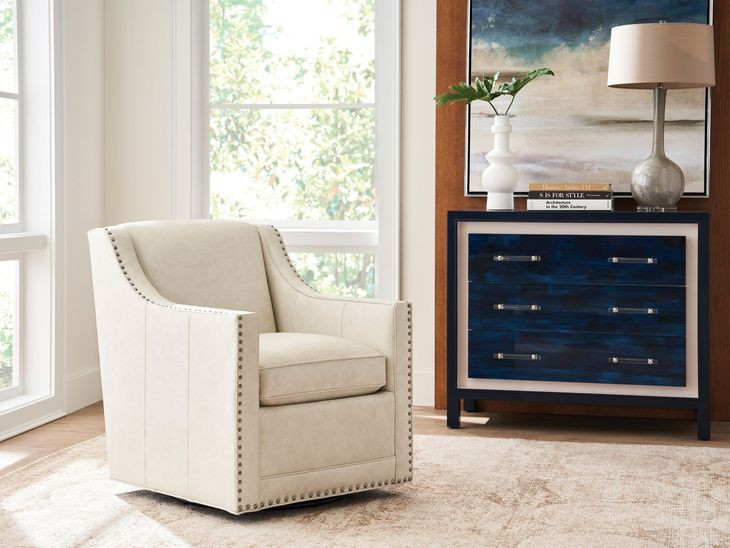 Barrier White Leather Upholstered Swivel Chair with Nailhead Trim