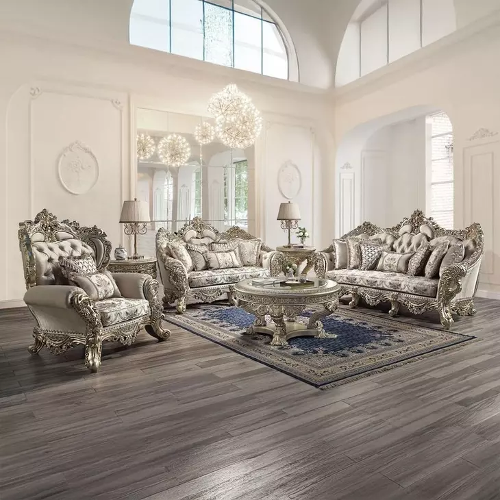 Danae Champagne and Gold Upholstered Lounge Chair with Pillows and Nailhead trim