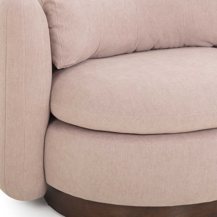 Nura Pink Upholstered Swivel Accent Chair with Pillow
