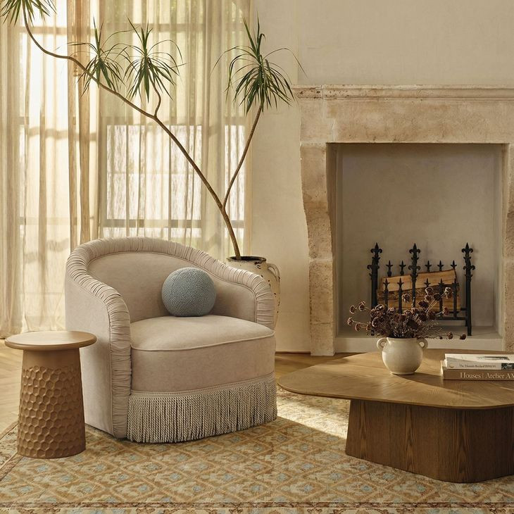 Pamela Tan Performance Fabric Upholstered Swivel Tassel Lounge Chair