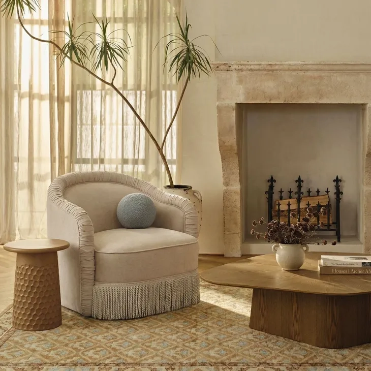 Pamela Tan Performance Fabric Upholstered Swivel Tassel Lounge Chair