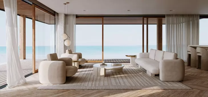 Overlap Latte and Travertine Round Cocktail Table from Caracole