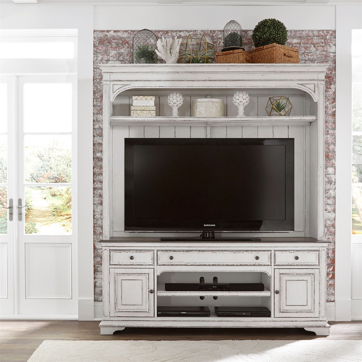 Magnolia Manor Antique White Entertainment Wall Unit from Liberty