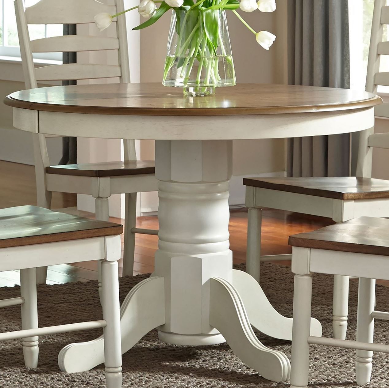 Springfield Honey and Cream Extendable Pedestal Dining Table from