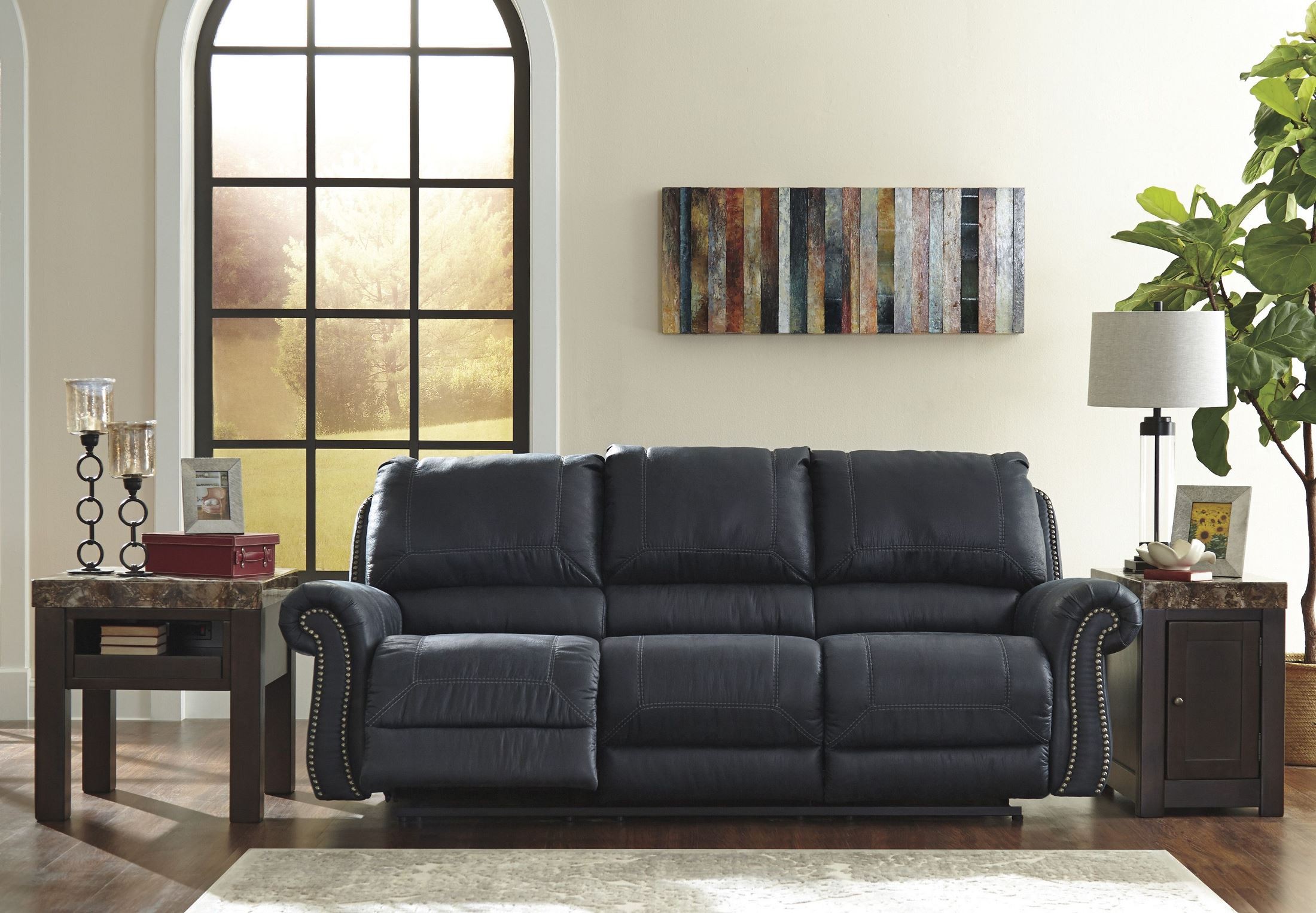 Milhaven Navy Reclining Sofa from Ashley Coleman Furniture