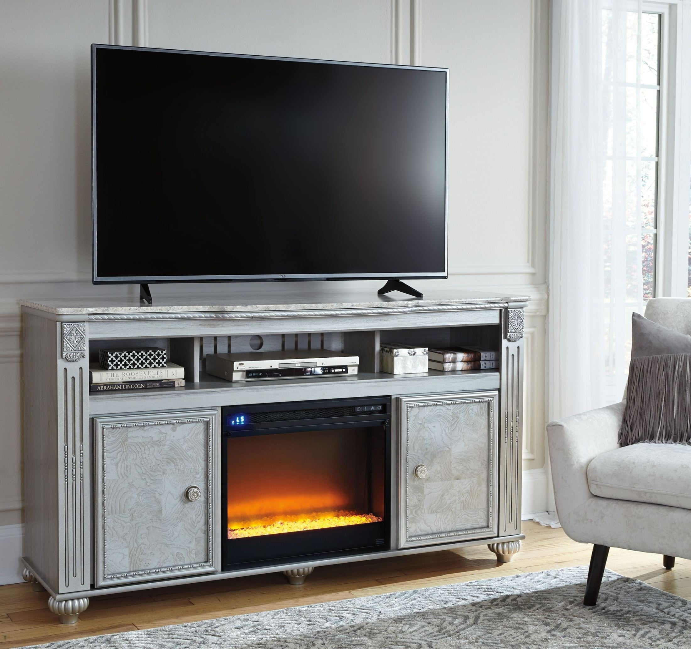 Zolena Brown LG TV Stand With Glass And Stone Fireplace from Ashley