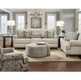 Carys Doe Beige Upholstered Chair and A Half with Pillows and Nailhead Trim