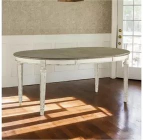 Realyn White Oval Extendable Dining Table