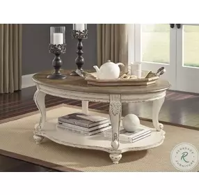 Realyn White And Brown Oval Cocktail Table