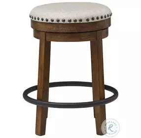 Valebeck Beige And Brown Swivel Counter Height Stool