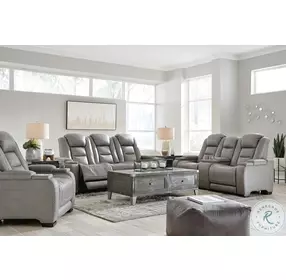 The Man-Den Gray Leather Power Reclining Living Room Set with Adjustable Headrest