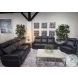 Valmour Black Leather Power Reclining Sofa