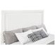Marielle Distressed White King Upholstered Panel Bed