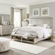 Ivy Hollow Weathered Linen and Dusty Taupe California King Storage Panel Bed with Nailhead Trim