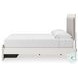 Ravalori White King Upholstered Panel Storage Bed
