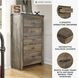 Trinell Brown Five Drawer Chest