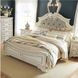 Realyn Chipped White Queen Upholstered Panel Bed