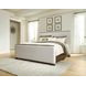 Brillynd Burnished Brown and White Performance Fabric King Upholstered Panel Bed