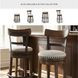 Valebeck Brown Upholstered Swivel Counter Height Stool