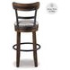 Valebeck Brown Tall Upholstered Swivel Bar Stool