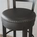 Valebeck Black Upholstered Swivel Counter Height Stool With Ladder Back