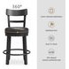 Valebeck Black Upholstered Swivel Counter Height Stool With Ladder Back