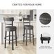 Valebeck Black Tall Upholstered Swivel Bar Stool