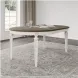 Realyn White Oval Extendable Dining Table