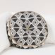 Radiant Oasis Nubia Black and White Round Accent Pillow