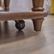 Bellevue Whiskey Brown Round Coffee Table with Casters