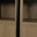 Sloan Light Brown and Black 4 Door Sideboard