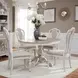 Magnolia Manor Antique White and Weathered Bark Upholstered 5 Piece Extendable Pedestal Base Dining Set
