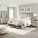 Ivy Hollow Weathered Linen and Dusty Taupe California King Storage Panel Bed with Nailhead Trim
