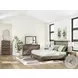 Jusika Brown King Panel Bed