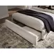 Shoralli Beige Queen Upholstered Storage Panel Bed
