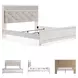 Altyra White King Upholstered Panel Bed