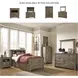 Trinell Brown Twin Bookcase Bed With 2 Storage Drawers